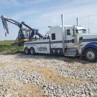 Small trackhoe recovery