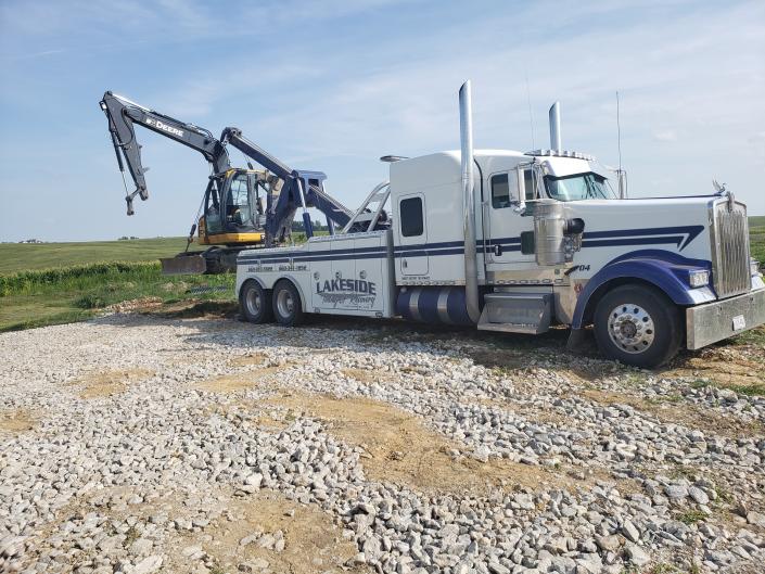 Small trackhoe recovery